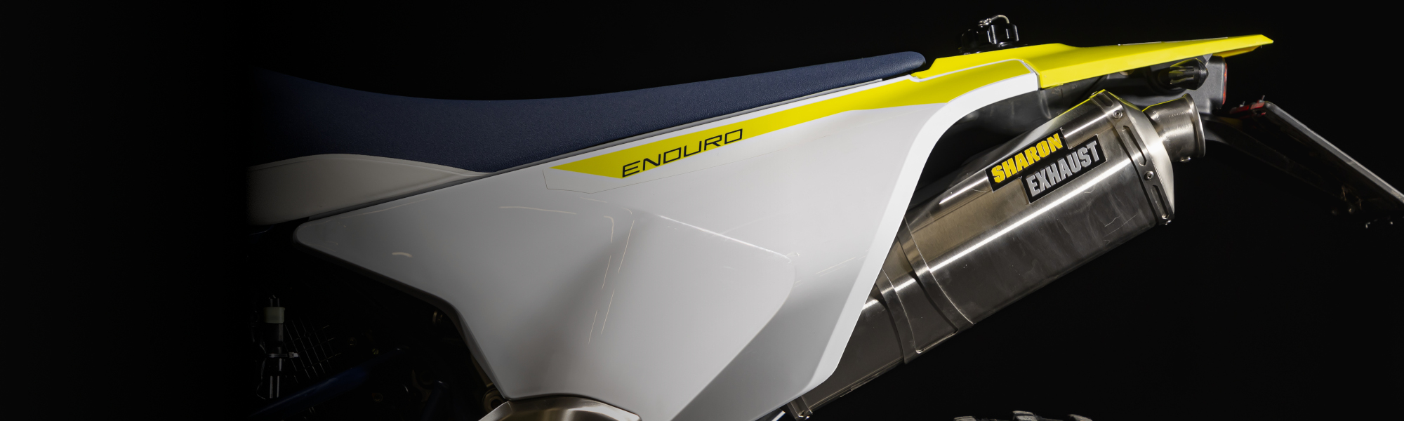 rade-garage-husqvarna-701-sharon-exhaust-banner