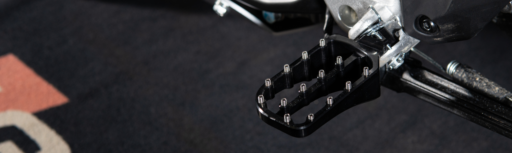 rade-garage-cfmoto-footpegs-banner